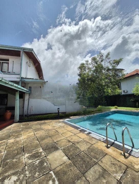 Land with house for sale on Nandamitra Place off Balapokuna Road