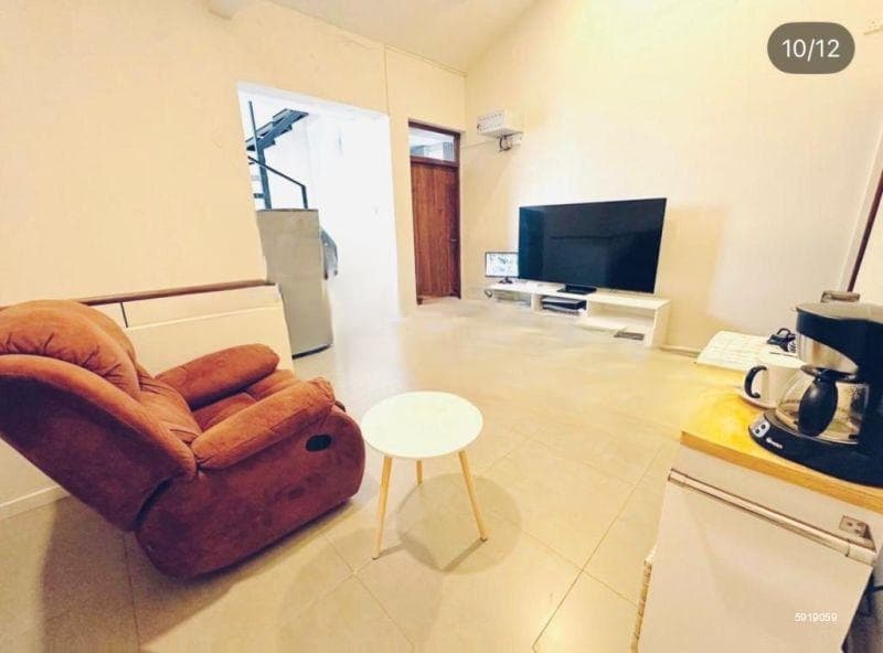 A modern 4-bedroom, 3-bathroom commercial/residential house located on a quiet lane