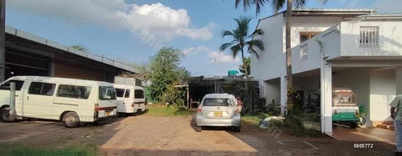 Land with a house and an Office complex