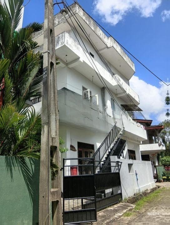 Two-unit house with six bedrooms, three washrooms, two kitchens, rooftop, etc.